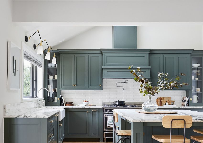 muted blue-green kitchen cabinets