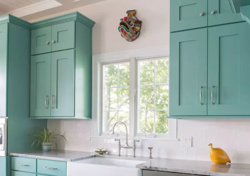 muted blue green kitchen cabinets
